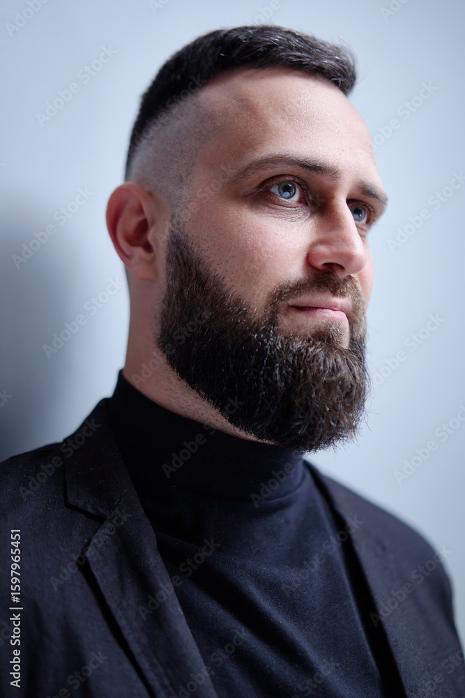 Fototapeta premium Studio portrait of young handsome man with beard.