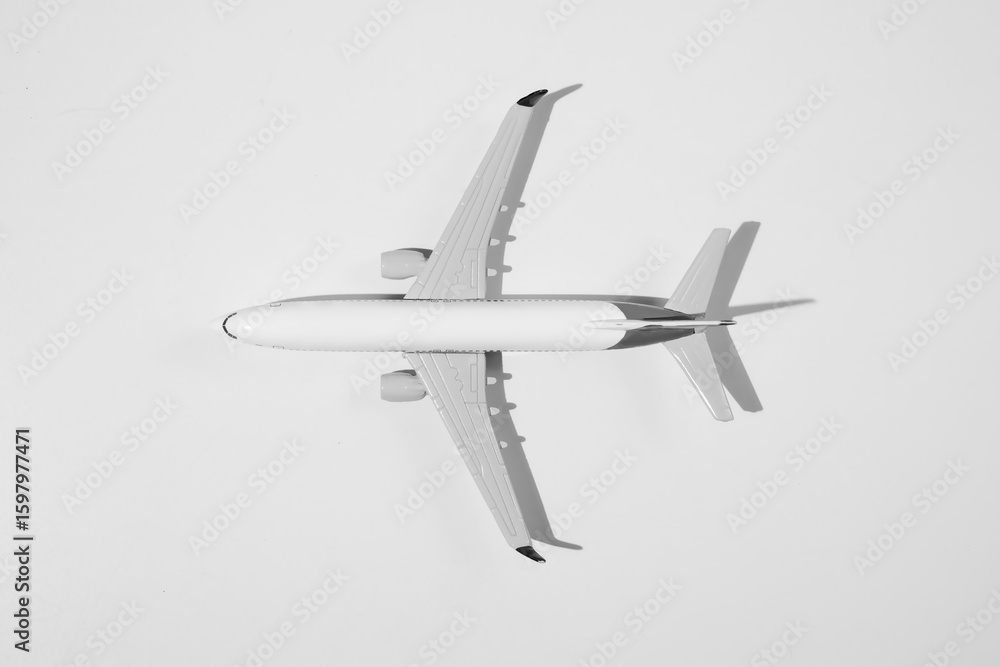 Passenger airliner isolated over a white background. Top view Passenger airliner isolated over a white background. Top view