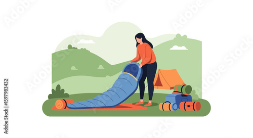 Preparing For Peaceful Camping Trip With Sleeping Bag On a Green Valley