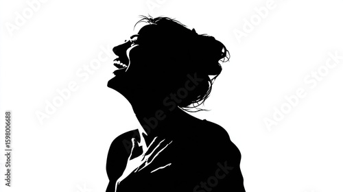 Silhouetted woman with her head back laughing in stark black and white contrast