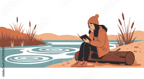 Young Woman Reading a Book Sitting on a Log by the Lake in Autumn