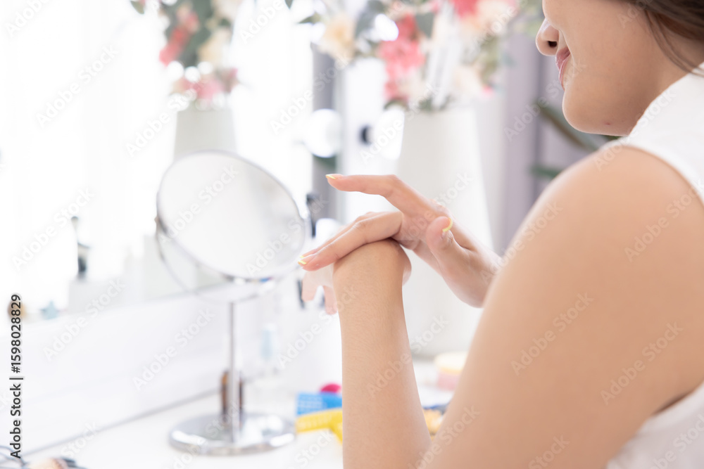 Naklejka premium Skincare, selfcare, beauty, hands, woman lifestyle skincare gently applying lotion in daily care moment, expressing wellness being healthcare, moisture ritual, clean glow, and modern advertisement