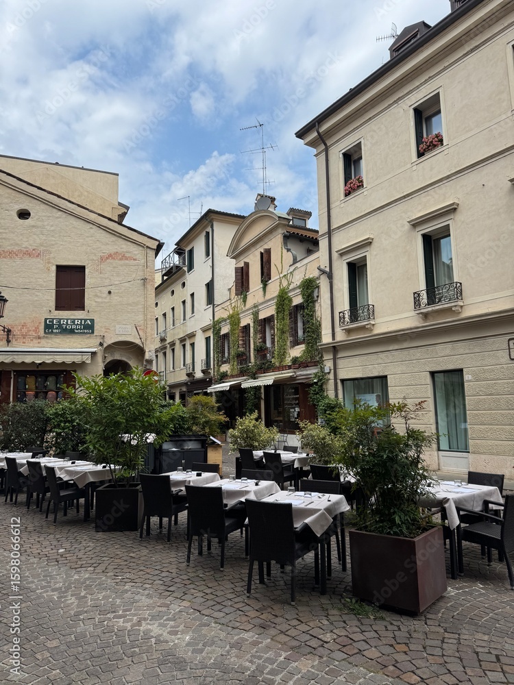 Obraz premium street cafe in the city