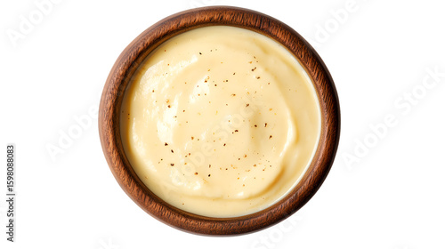 Top View of Queso Dip in a Wooden Bowl Isolated on White Background