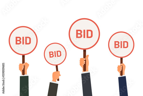 Bidders raise paddles in competitive auction, offering prizes to win items in lively sale