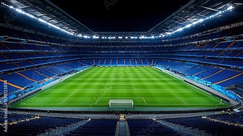 Empty football stadium under the night sky.