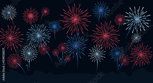 Colorful fireworks display at night with red and blue bursts