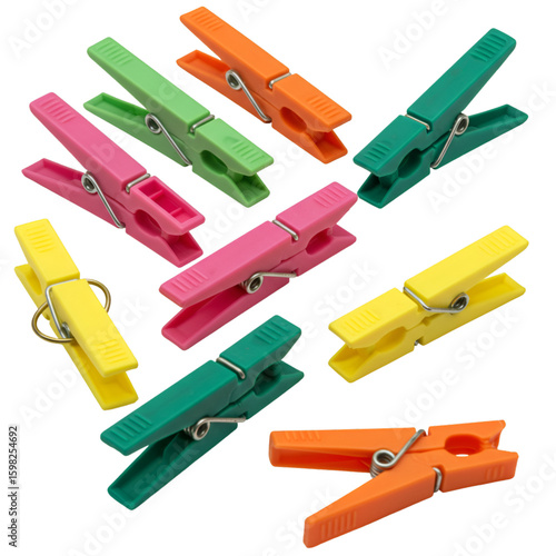 Scattered Colorful Plastic Clothespins on Black Background