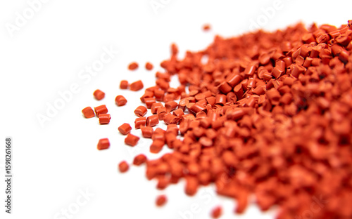 Obraz na płótnie Red plastic polymer granules isolated on white
