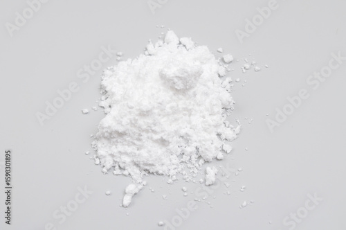 Creatine Powder on light grey background