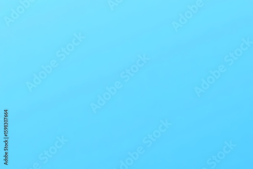 Solid light blue background with subtle gradient effect creating a smooth and uniform surface suitable for various design applications