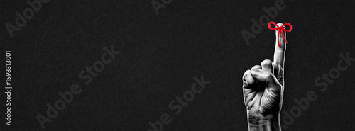 Photography Rope Bow on Finger Pointing Sign in Black and White on Textured Paper Background