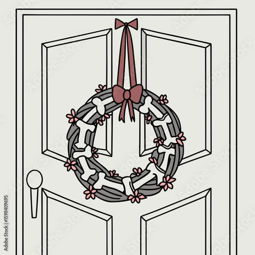 A gray christmas wreath with a bow and skull ornaments hanging on a gray door with a door handle seen