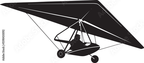 Silhouette of a Hang Glider with Pilot Soaring Through the Air Adventure and Freedom