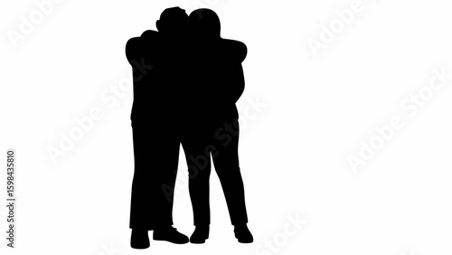 Silhouette of couple embracing each other closely