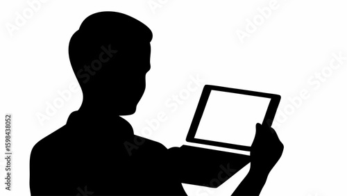Silhouette of person holding a laptop computer up