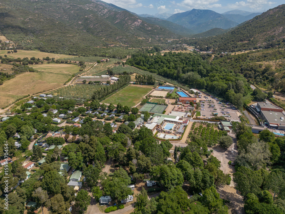 Fototapeta premium Aerial View Popular tourist camping Sagone Campsite hilltop located on the western coast of Corsica island Corse France