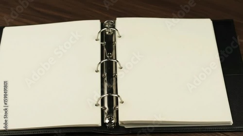 Wallpaper Mural Open black binder blank white pages wooden desk background for business school office notes ideas presentations planning writing clean empty template creative s Torontodigital.ca