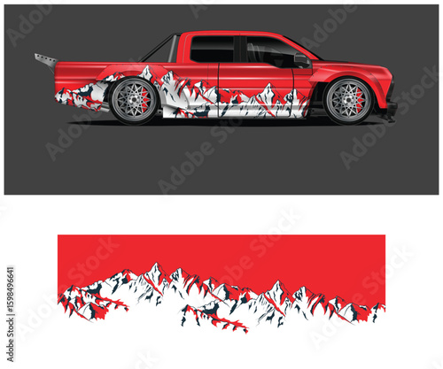 Red Truck with Mountain Graphic Wrap Design on a Dark Gray Background
