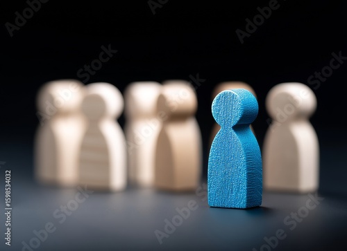 Wallpaper Mural A blue wooden figure, distinct from two groups of identical beige figures, stands alone, symbolizing individuality and difference Torontodigital.ca