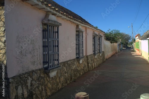 Sometimes modern and thriving, sometimes rural and colonial, houses made from the same land still prevail, as well as the modern use of concrete.