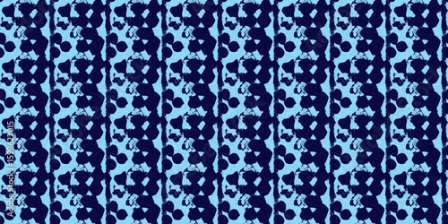Abstract indigo blue batik dye seamless pattern, Organic bleed effect dyed wash background.