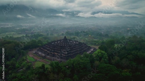 Aerial view of Borobudur Temple on a cloudy, foggy day after rain.