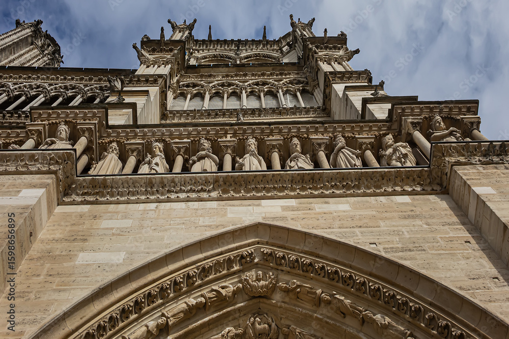 Fototapeta premium View of Notre Dame de Paris Cathedral. Five years after the catastrophic fire at Notre Dame Cathedral, it has appeared fully restored. Paris. France.