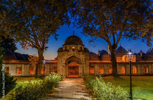 Inner courtyard of the majestic Suleymaniye Mosque, an Ottoman imperial mosque at sunset in Istanbul, Turkey