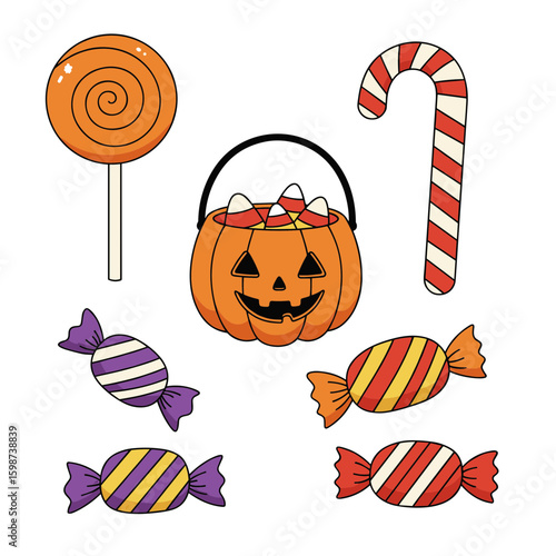A collection of halloween candies including a pumpkin bucket and lollipop