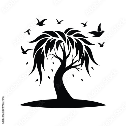 Elegant silhouette of a weeping willow tree with birds taking flight at dawn