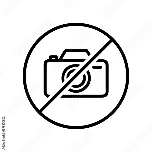 A restricted photography area symbol with a camera inside a circle and a line through it is shown here