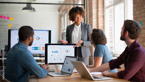 Corporate Business Meeting with Teamwork, Data Analysis and Strategic Planning