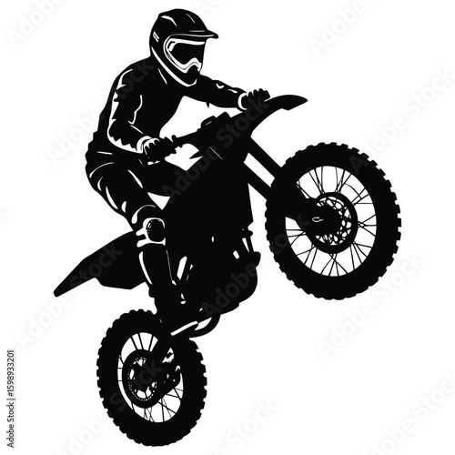 Black Silhouette of Motorcross Rider Performing a Wheelie on a Dirt Bike