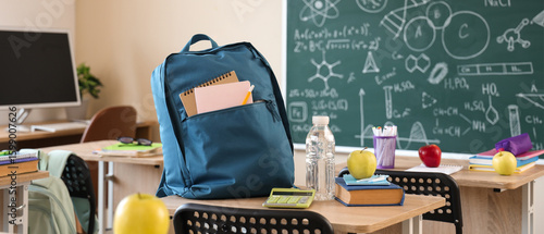 Apple with book, water bott...