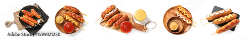 Photography Set of tasty corn dogs on white background, top view