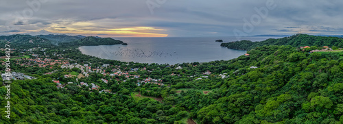 Beautiful  aerial view of Playas del Coco, Costa Rica — golden beaches, lush hills, and a scenic bay filled with yachts, perfect for tourism, ocean adventures, and tropical getaways