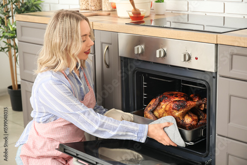 Beautiful young woman takin...