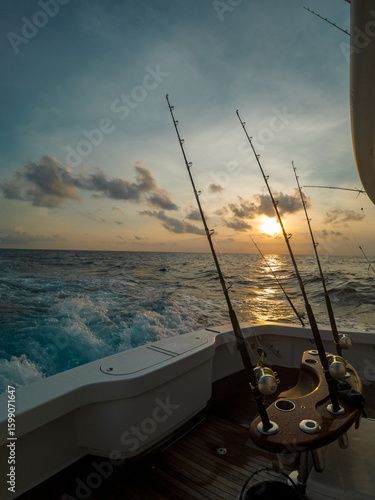 Sport fishing adventure off the coast of Costa Rica — aerials and onboard shots of yachts, deep sea fishing rods, and anglers in action under dramatic ocean skies