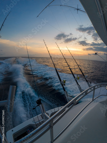 Sport fishing adventure off the coast of Costa Rica — aerials and onboard shots of yachts, deep sea fishing rods, and anglers in action under dramatic ocean skies