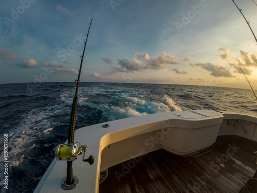 Sport fishing adventure off the coast of Costa Rica — aerials and onboard shots of yachts, deep sea fishing rods, and anglers in action under dramatic ocean skies