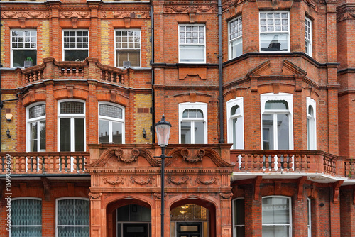 Canvas Print ornate brick apartment buildings with bay windows  and  in London, England