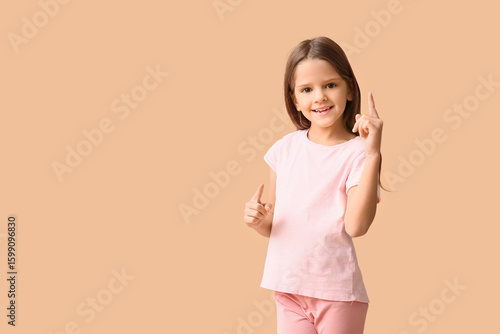 Portrait of happy little gi...