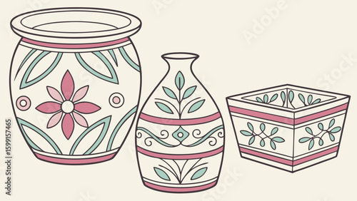 Decorative ceramic vases and planter with floral and leaf motifs