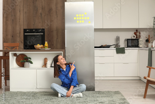 Young woman pointing at fri...