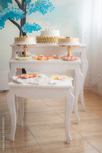 Elegant Dessert Display with Golden Accents