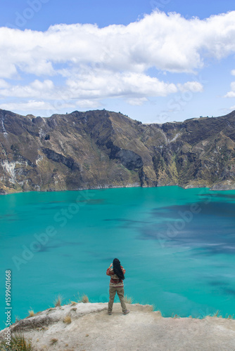 Young Woman Contemplating the Turquoise Waters