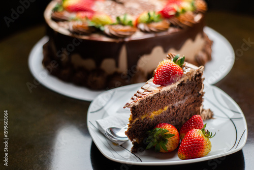 Chocolate Drip Cake with Strawberries on Elegant Display
