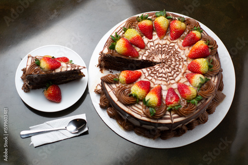 Chocolate Drip Cake with Strawberries on Elegant Display