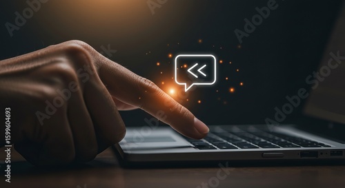 Finger Pressing Virtual Share Icon over Laptop Keyboard
